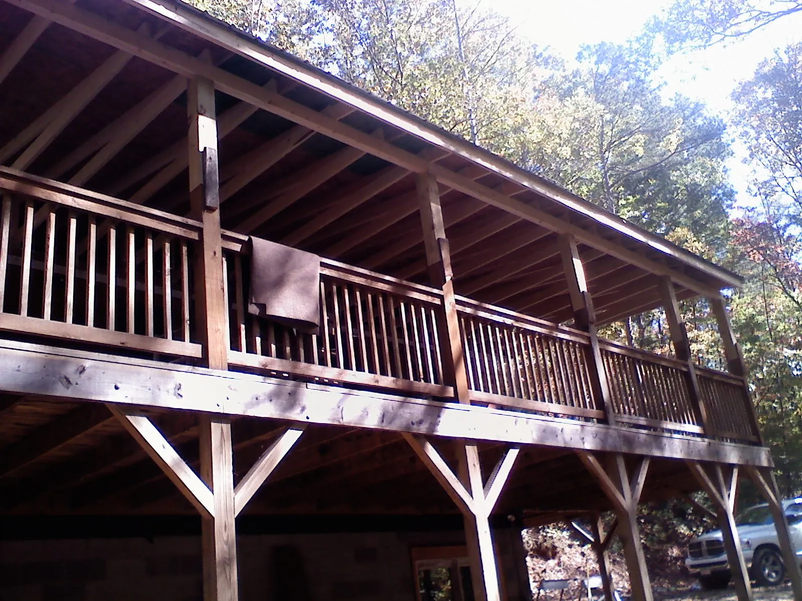 Timber framing under a new elevated porch and deck — Roof Leak Repair in Stanwood by Roofing Brothers